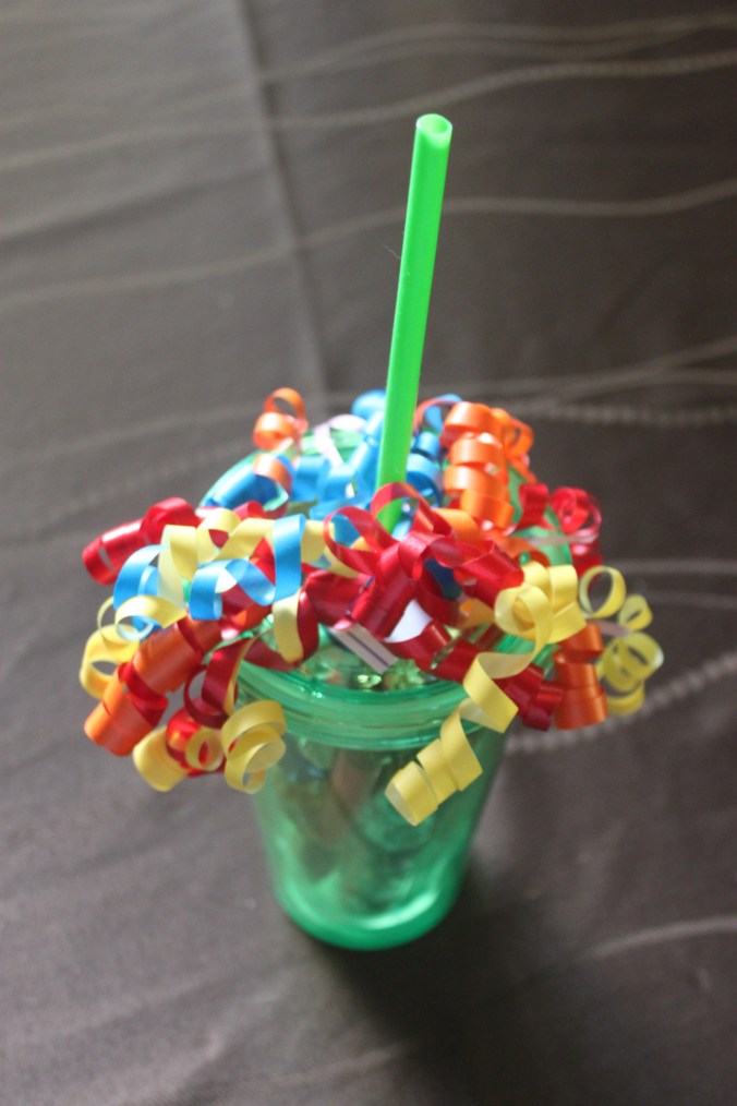 Acrylic Tumbler with Straw stuffed with goodies