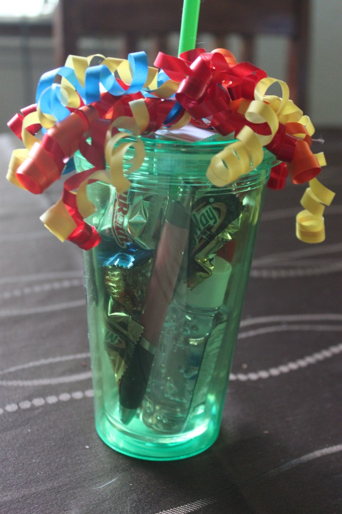 Acrylic Tumbler with Straw stuffed with goodies