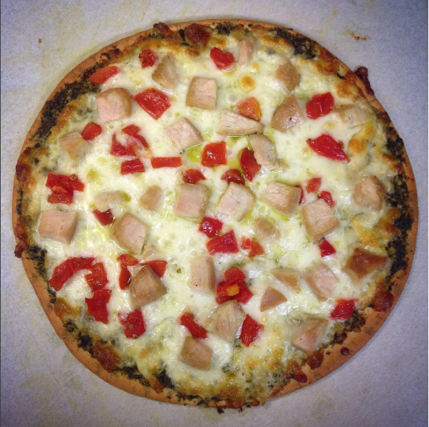 Gluten free pesto, turkey and Roma tomato pizza